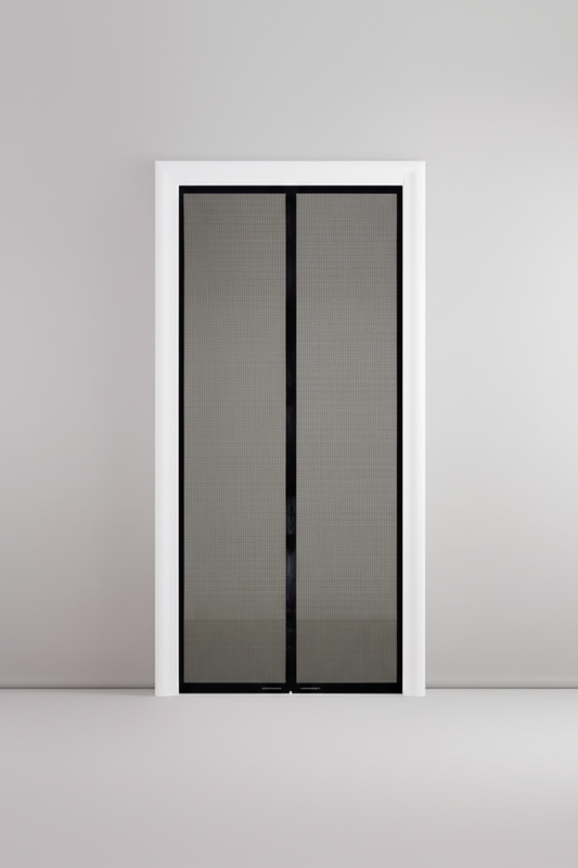 Modern interior design with a sliding glass door, clock, and plant.